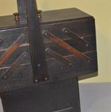Mid century sewing cabinet, "accordion" style that pulls out to reveal lots of storage.