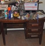 One of many desks throughout the home and garage!  Lots of sewing supplies and fabric.