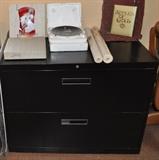 Black metal 2-drawer lateral file cabinet, Marilyn Monroe plates, Babe Ruth plates, old basket.