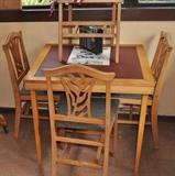How cool is this -- wooden folding coffee table with four folding chairs to match.