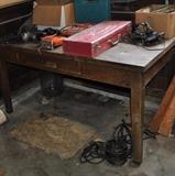 Desk?  Work table?  Milwaukee sawzall with case, lots more stuff that guys want!