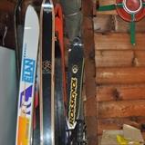 Skis, ski poles, Christmas tree stands from years past.
