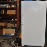 GE 17.1cf manual defrost upright freezer -- keep it full of food and it won't get full of ice!  Old vacuum, miscellaneous stuff on the shelves.