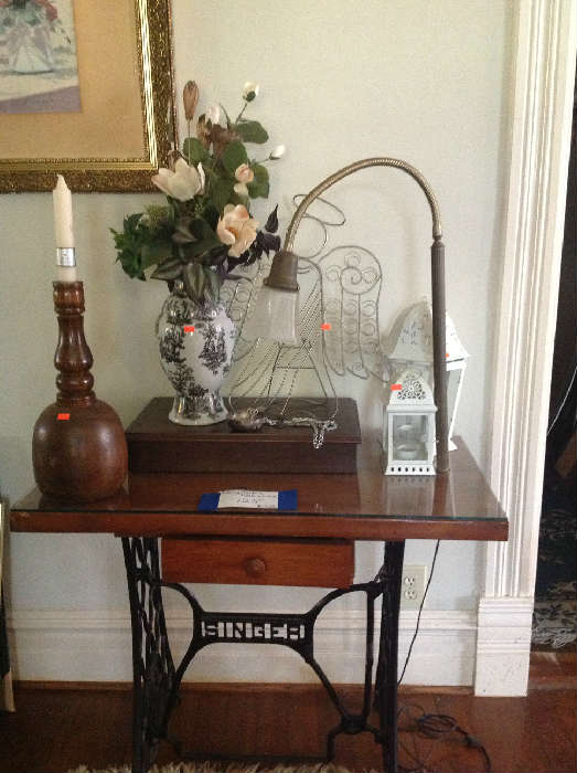 Unusual sewing table with attached lamp.  Cool repurpose item.