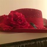 Red hat waiting for that purple dress