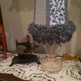 Miniature sewing machine; small lamp with blue shade