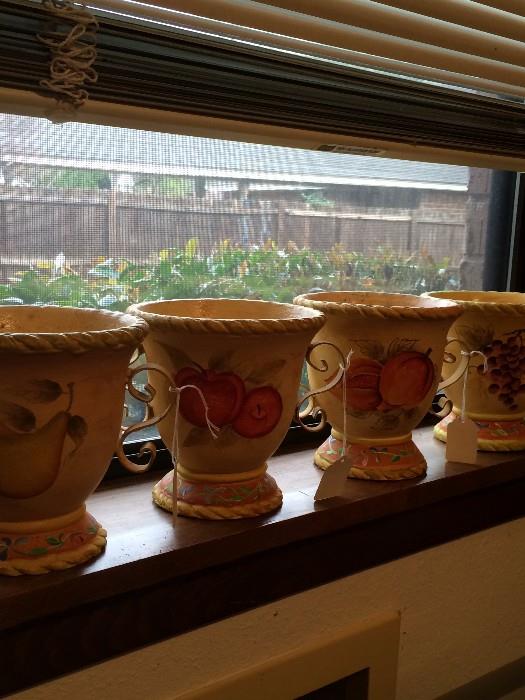 Decorative urns painted with different fruits 