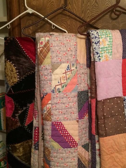Some of the several quilt selections including a crazy quilt