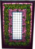C/1890's Stained and beveled glass Victorian window w/grapes and a grape leaf border, in a new Oak frame measuring 31 x 45 1/2" Overall
