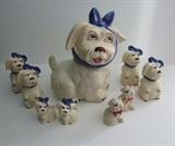 Shawnee Pottery "Muggsy" Cookie jar w/3 sets of S&P's including 2 range sets (Also includes a Puss & Boots S&P Set)