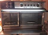 Mid Century Frigidaire "Flair" oven and pull-out range.