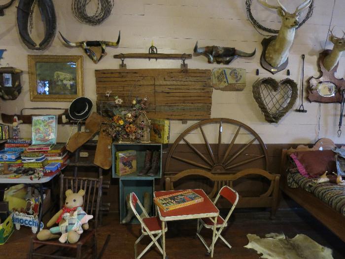 Pecan Wood Wagon Wheel Headboard With Yoke Footboard-Full Size Bed, Mounted Steer Horns, Deer Mounts, Rifle Mounts, Vintage Rustic Barbed Wire Display