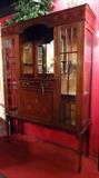 MAHOGANY INLAID CHIFFONIER, MIRRORED CENTER SHELF FLANKED BY TWIN GLASS DOOR CABINETS