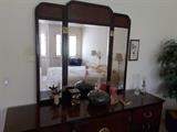 Close up of Asian Dresser with Mirror and Decorative Collectibles