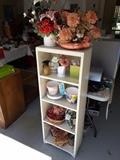 Small 4 Drawer Wood Shelf with Collection of Decorative Planter Pots and Fake Flowers, some marbles and stones for inside the pots too.