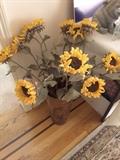 Decorative Sun Flowers in a Metal Stand (can be an umbrella stand or for decorative flowers for example).