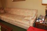 8 foot Hollywood Regency sofa. Excellent condition and very comfortable!
