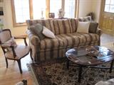 Like new furniture: Sofa and matching love-seat. Butler coffee table. New Zealand wool rug. Louis XV style armchairs.
