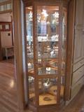 Corner curio cupboard.