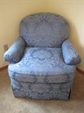 Damask ottoman with matching armchair.