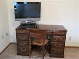 Desk and flat screen TV. 5 disc DVD/CD player.