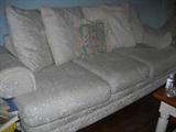 overstuffed white sofa