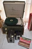 Vintage turntable and antique cameras