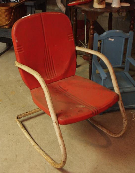 It's the real deal vintage aluminum rocking chair - there's an identical one - STILL IN THE BOX! Never assembled. 