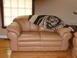 This photo is light, the sofa photo is more accurate color..really nice set!