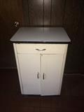vintage enamel top cabinet