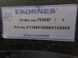 EKORNES MADE IN NORWAY / BLACK LEATHER CHAIR AND OTTOMAN