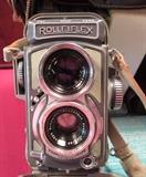 rolleifex camera with case and all the extra's + film - flash bulbs- extras