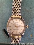Vintage Oyster Rolex, with papers. Has crack on face