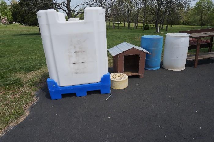 dog house, barrels, water tank