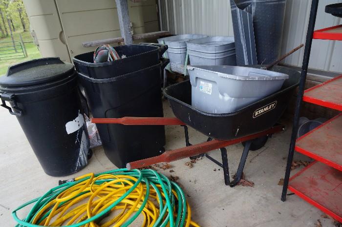 wheelbarrows, garden hoses, trash containers,  galvanized tubs