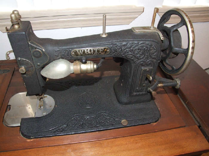 WHITE ELECTRIC ANTIQUE SEWING MACHINE, MODEL # 396735