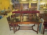 GRAND RAPIDS CHAIR AND BOOKCASE DINING TABLE AND SIX CHAIRS