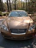 2007 Lexus ES 350 4-door Sedan, in Amber Pearl exterior, w/Cashmere interior; VIN # JTHBJ46G372075399, 78,420 miles. Thoughtfully equipped with: 3.5 L engine, power locks, sunroof, Cassette/CD/AM/FM stereo, auxiliary audio input, rear defroster, ABS brakes, heated front seats, memory seats, A/C front seats, navigation system, premium package, automatic transmission, power windows, A/C, cruise control, full leather seating, memory seats, power mirrors, alloy wheels, traction control, satellite radio ready, side airbags, overhead airbags, rear sunshade, rear view camera, smart key.