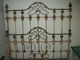 huge fine iron bed with magnificent paint patina--several iron bed frames are for sell