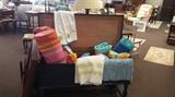 Lots of throw rugs, bath mats , throws