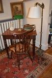Writing desk, brass floor lamp. 
