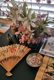Asian items.  Jars, hangings, cut art, tiny shoes from china