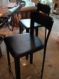 Black bar stools by Frag