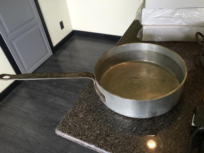  Huge commercial cast aluminum frying pan in pots.