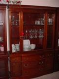 Beautiful china cabinet with mahogany dining room set.