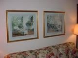 Two of many framed prints in the sale.