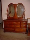This beautiful double oval mirrored dresser is part of the Queen size bedroom set.