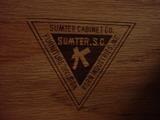 Sumter Cabinet Company is the maker of the Queen Maple Bedroom Suite with double oval mirrored dresser.
