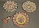 Lot 2:  4pc MACKENZIE CHILDS Ceramics. 3 Ruffled edge Plates: One marked "Rose Cottage". 1 Pottery Tassel with cotton rayon tassel skirt. All marked: Dimensions:  : W: 11 inches --- US Shipping charge: $35
