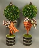 Lot 20:  Pr MACKENZIE CHILDS Topiary Trees. Courtly Check. Lots of ribbons on real preserved boxwood  topiary trees. Hand painted courtly check vessel. Marked. : Dimensions:  H: 28.5 inches: W: 10 inches --- US Shipping charge: $50